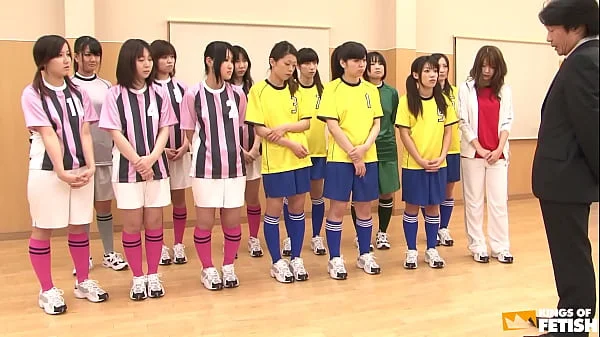 Japanese female team listen and take a lesson from their coach